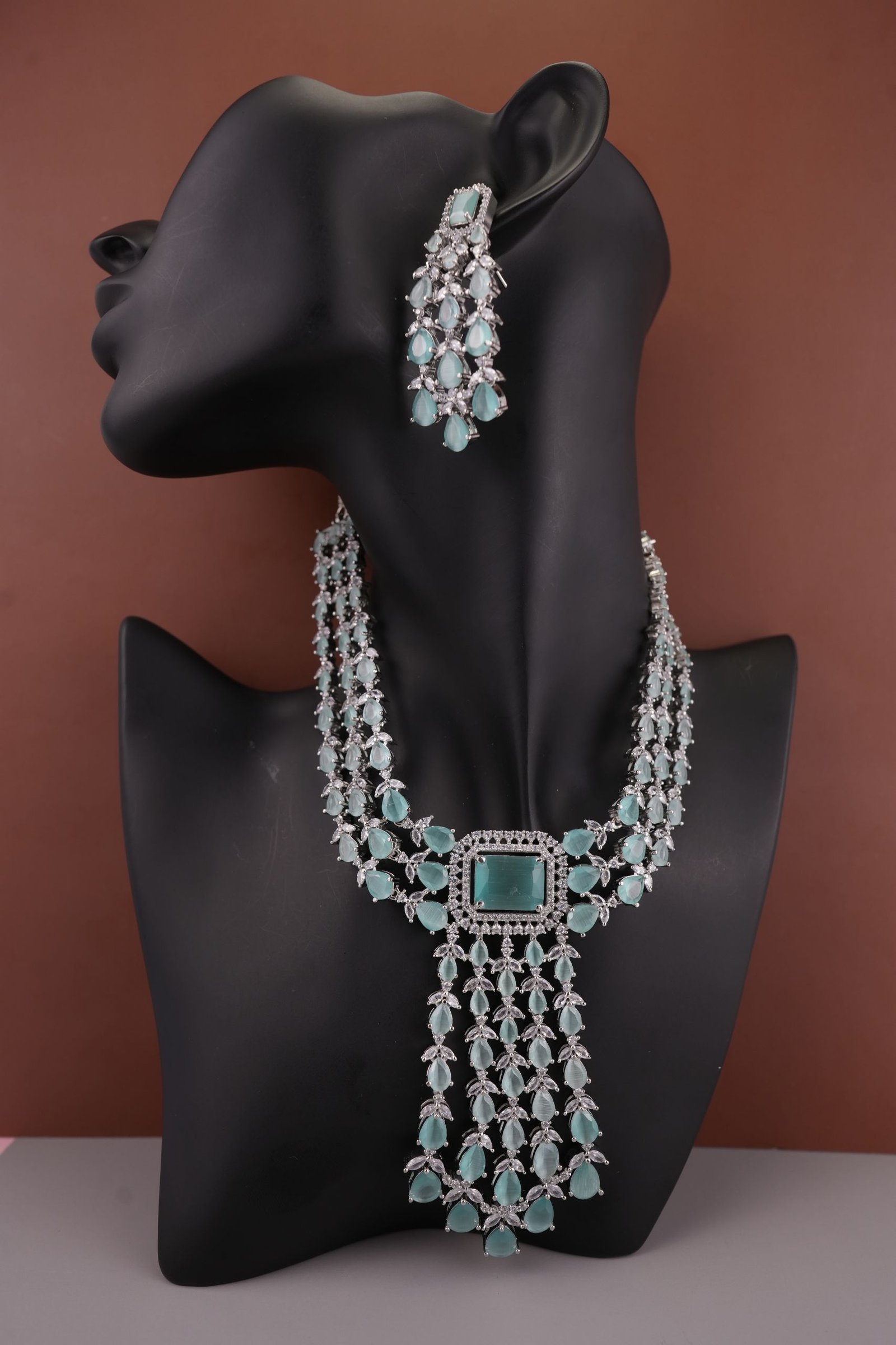 Three-layered Emerald Elegance AD Stones Silver Plated Drop Earrings Jewellery Set